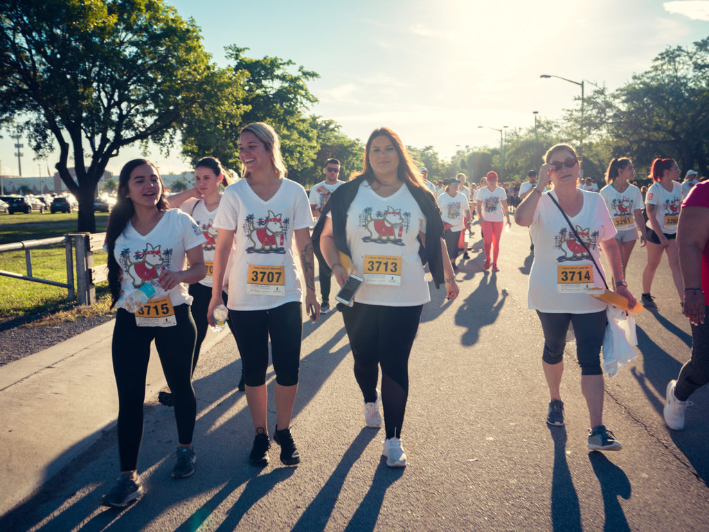 Petland Pembroke Pines team members smiling at camera and walking at St. Jude Walk