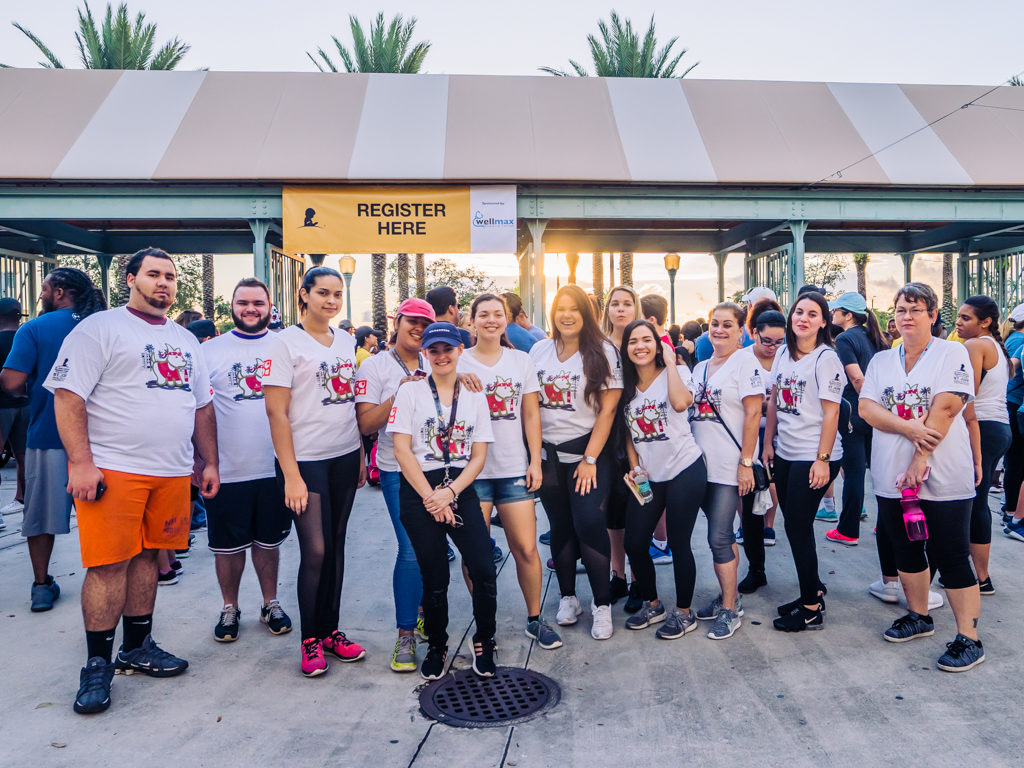 Petland Pembroke Pines team poses together before joining the fight against childhood cancer at the St. Jude Walk.
