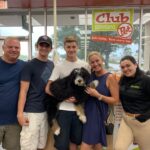 Petland Pembroke Pines picture of family of Marjory Stoneman Douglas High School survivor holding their cute Petland puppy.