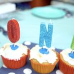 Petland Pembroke Pines picture of yummy doggy cupcakes with candles that say "one" for puppy's first birthday.