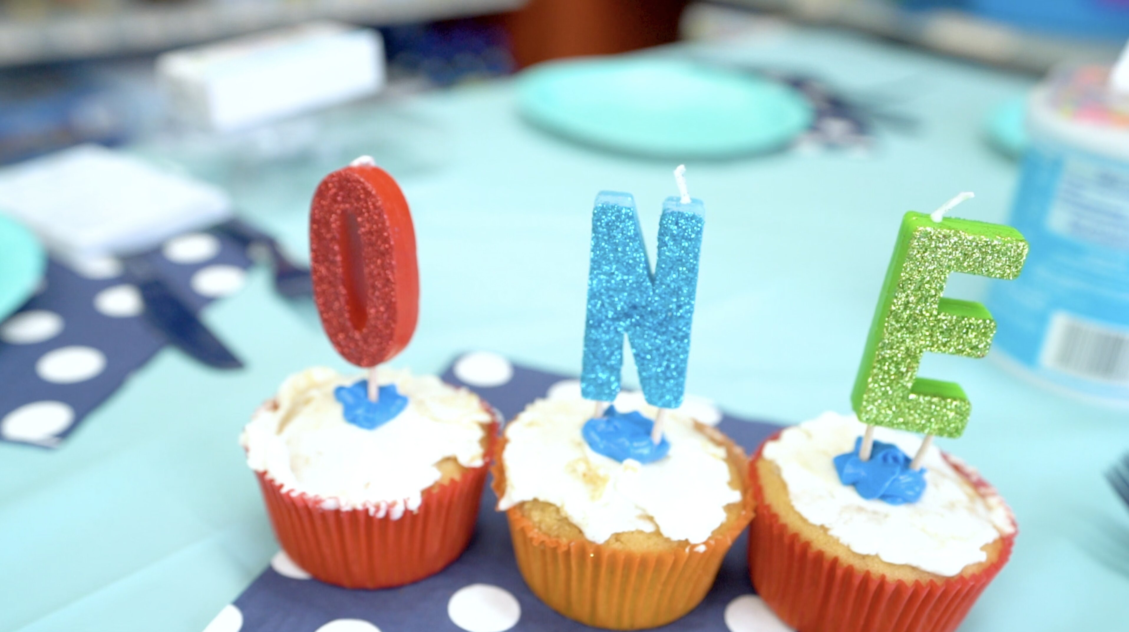 Petland Pembroke Pines picture of yummy doggy cupcakes with candles that say "one" for puppy's first birthday.