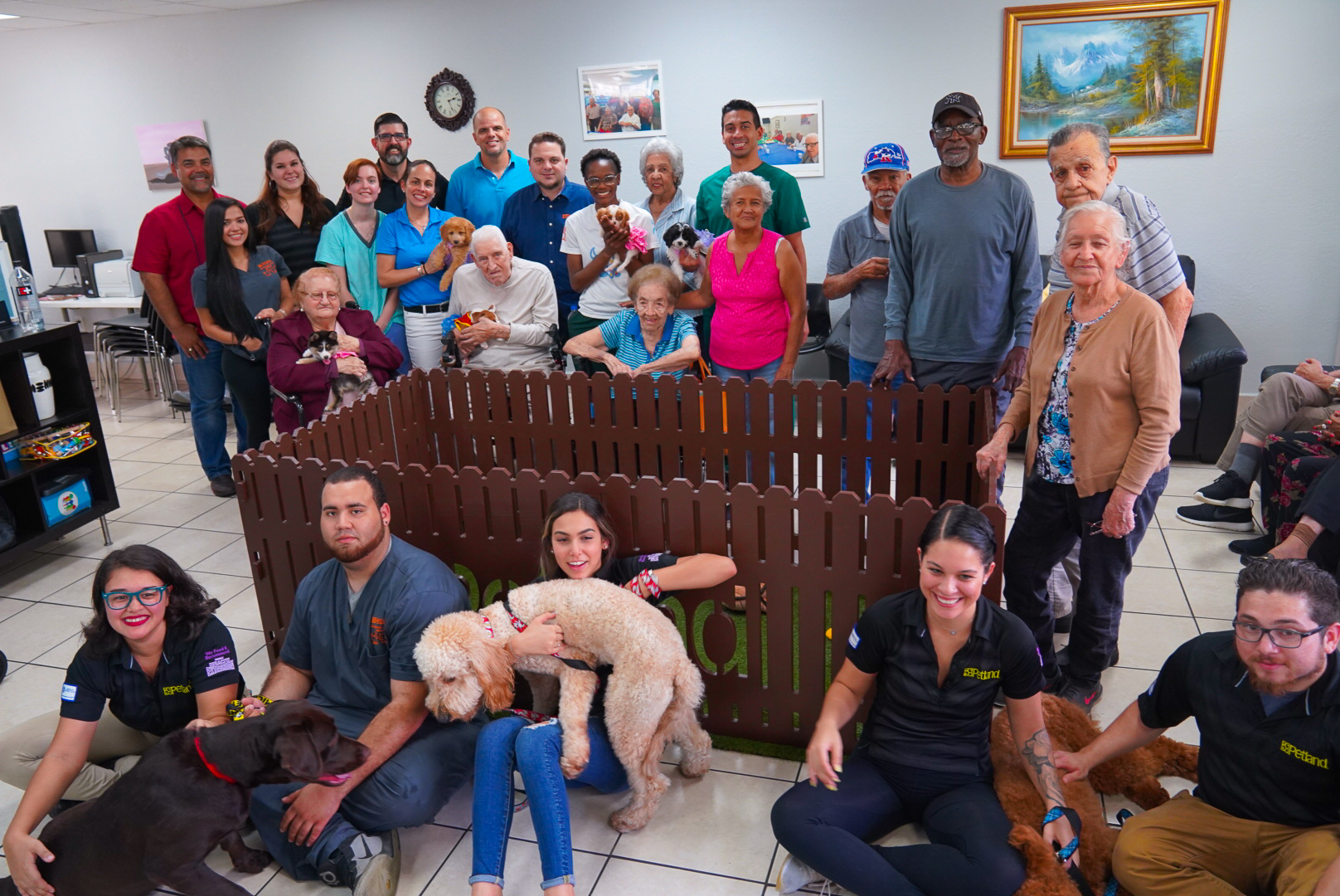Petland Pembroke Pines picture of patients at Always At Your Side Adult Day Care with cute Petland puppies.
