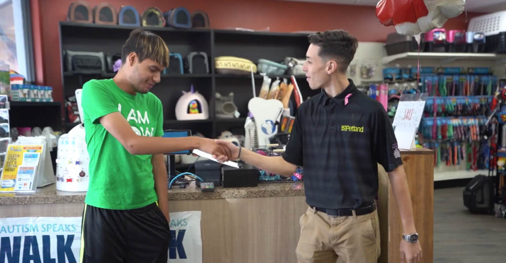 Petland Pembroke Pines picture of WOW Center patient Angel Rodriguez with a Petland employee at internship.