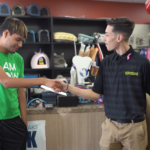 Petland Pembroke Pines picture of WOW Center patient Angel Rodriguez with a Petland employee at internship.