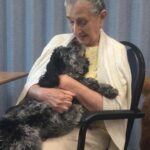 Petland Pembroke Pines picture of Southwest Focal Point Senior Center patient with a cute Petland puppy.