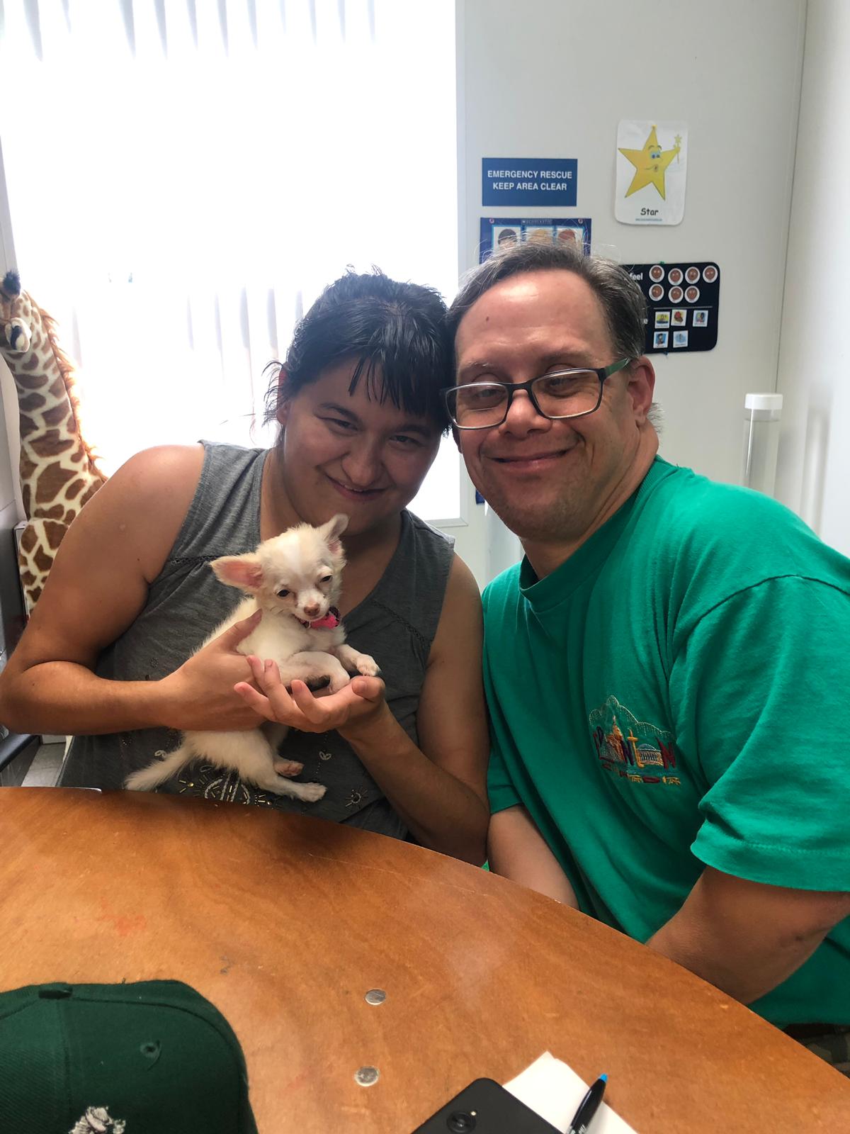 Petland Pembroke Pines picture of WOW Center patients with cute Chihuahua puppy.