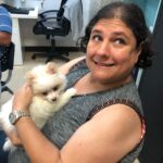 Petland Pembroke Pines picture of WOW Center patient holding a cute Petland puppy.