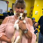 Petland Pembroke Pines picture of a patient from Lucanus Center holding a cute Petland puppy.