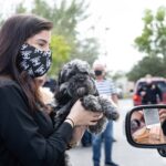 Petland Pembroke Pines picture of staff donating toys with Miami Power Team for Christmas drive-thru.