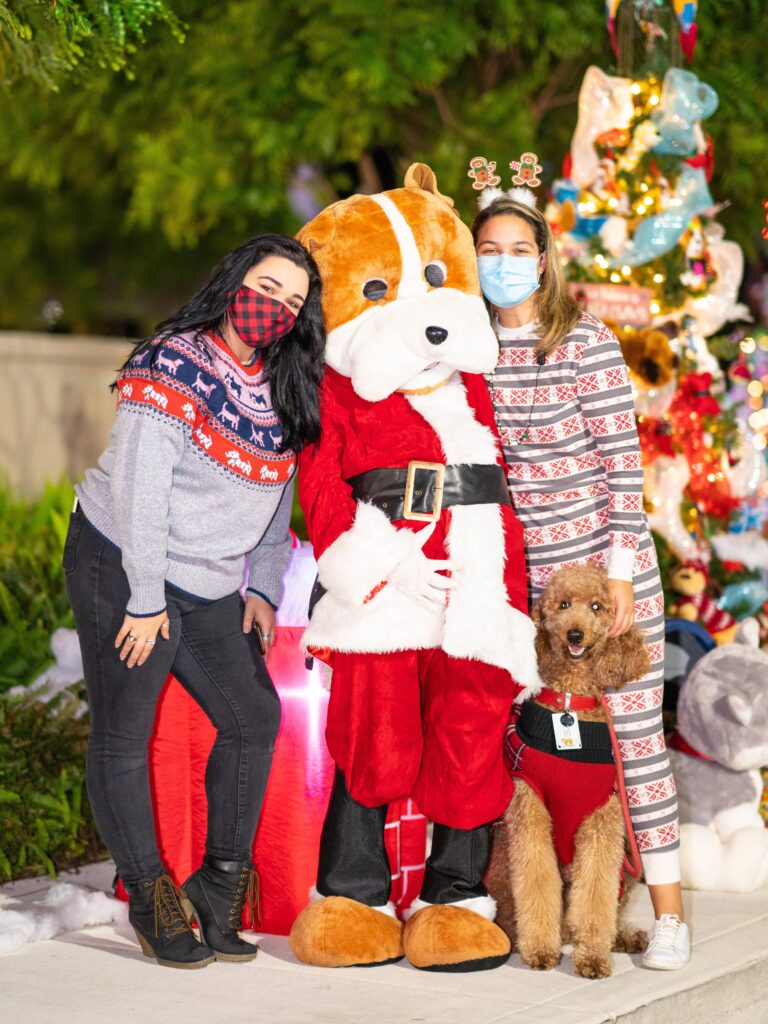 Petland Pembroke Pines picture of Petland Pembroke Pines staff at the drive-thru holiday drive for Christmas.